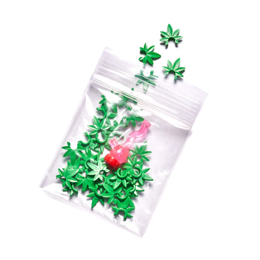 Small Bag of Fake Marijuana and Toy Bong - Bright Light Green